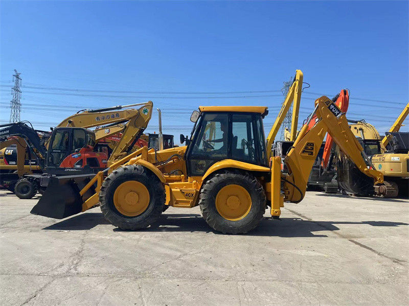Pochodzenie USA Stosowany JCB 4CX Ładowarka wyciągów używanych JCB 4CX Kołowy ładowarka wyciągów